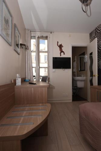 Habitación Individual del hotel AMELIE HOTEL. Foto 6