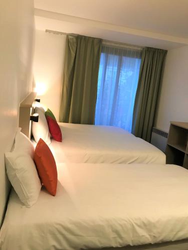 Estudio kitchenette del hotel AMHotel Italie. Foto 2