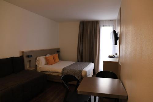 Estudio kitchenette del hotel AMHotel Italie. Foto 10
