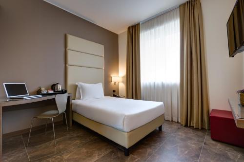 Habitación Individual del hotel Klima Milano Fiere. Foto 2