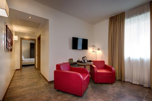 Habitación familiar 1 Cama king Sofá Cama incluido Agradable del hotel Klima Milano Fiere