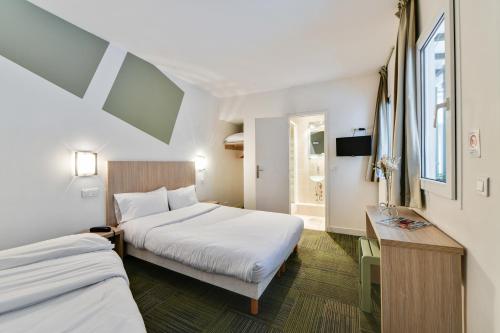 Habitación Triple del hotel Louisa. Foto 2