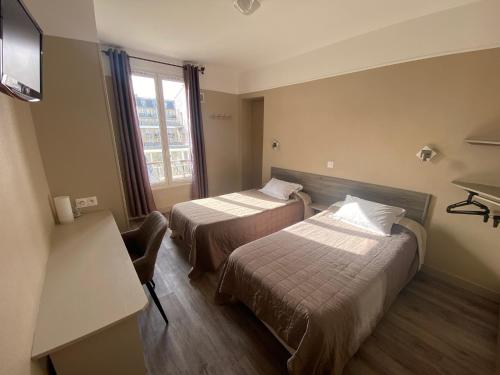 Habitación Doble - 2 camas del hotel ANGLETERRE. Foto 4