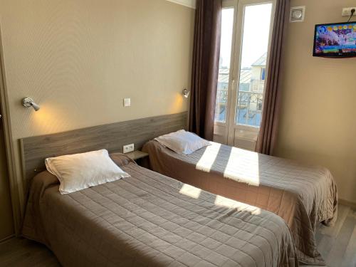 Habitación cuádruple del hotel ANGLETERRE. Foto 4