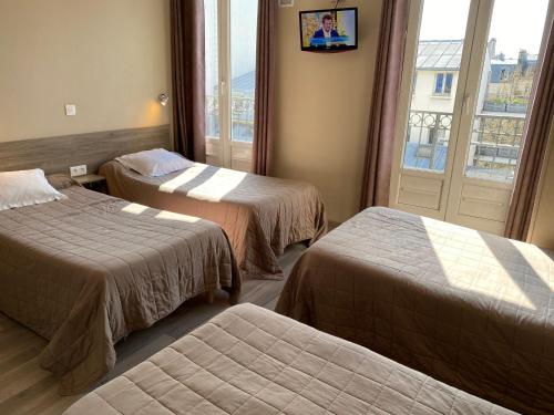 Habitación cuádruple del hotel ANGLETERRE. Foto 5