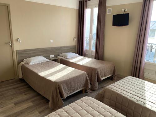 Habitación cuádruple del hotel ANGLETERRE. Foto 18