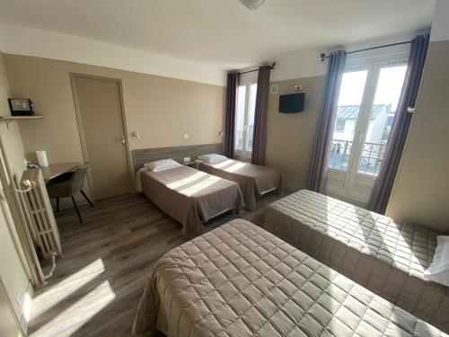 Habitación cuádruple del hotel ANGLETERRE. Foto 24