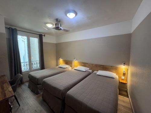 Habitación Triple del hotel ANGLETERRE. Foto 8