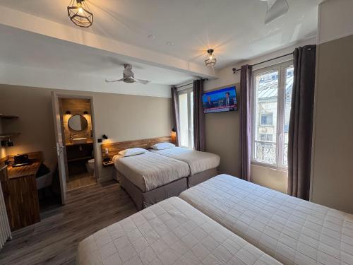 Habitación Cuádruple del hotel ANGLETERRE. Foto 9