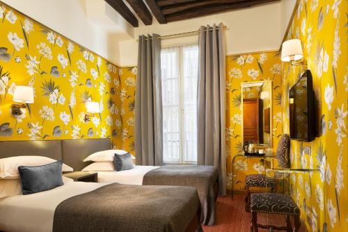 Dos Habitaciones comunicadas entre sí del hotel Saint Paul Rive Gauche