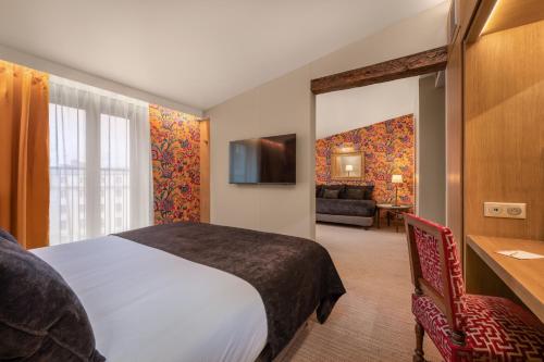 Dos Habitaciones comunicadas entre sí del hotel Saint Paul Rive Gauche. Foto 3