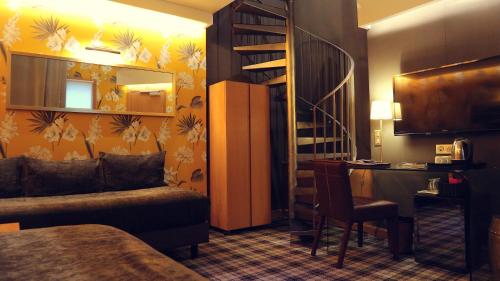 Habitación Cuádruple Dúplex del hotel Saint Paul Rive Gauche. Foto 1