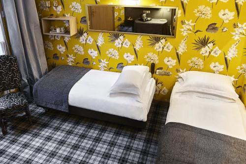 Habitación Cuádruple Dúplex del hotel Saint Paul Rive Gauche. Foto 4