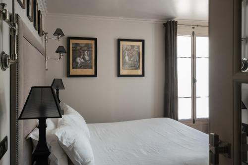 Habitación Doble Confort con balcón del hotel SAINT LOUIS EN L'ISLE. Foto 2