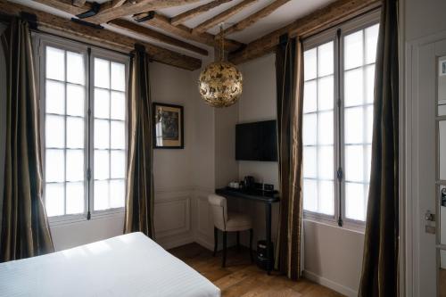 Habitación Doble Superior - Adaptada para personas de movilidad reducida del hotel SAINT LOUIS EN L'ISLE. Foto 2