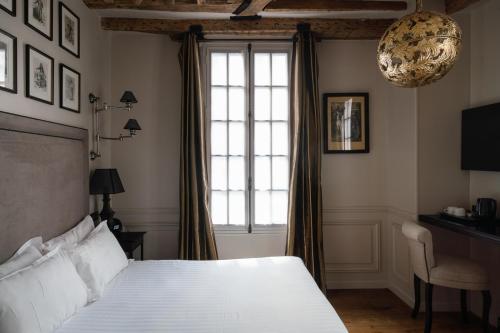 Habitación Doble Superior - Adaptada para personas de movilidad reducida del hotel SAINT LOUIS EN L'ISLE. Foto 3