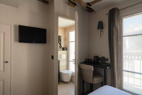 Habitación Individual Superior del hotel SAINT LOUIS EN L'ISLE. Foto 1