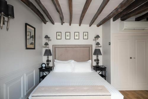Habitación Triple Deluxe con balcón del hotel SAINT LOUIS EN L'ISLE. Foto 1