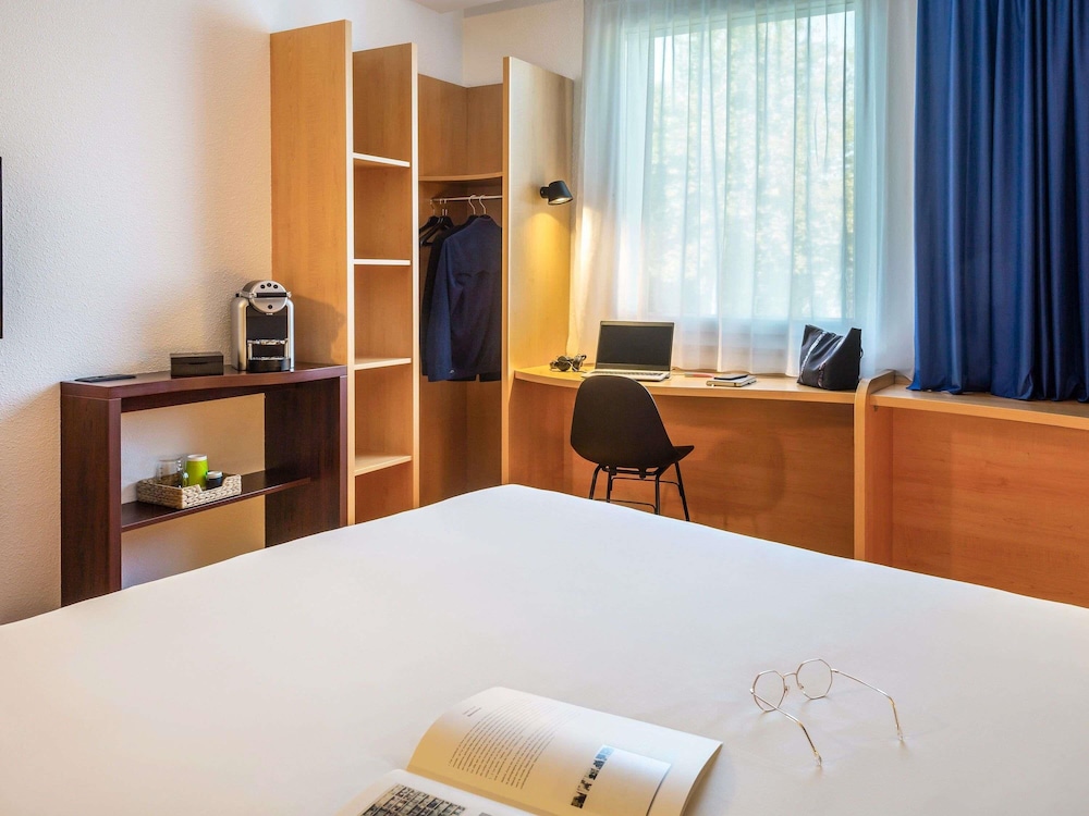 Habitación de categoría superior con nuestras innovadoras camas dobles de 160 x 200 cm del hotel Ibis Geneve Petit Lancy