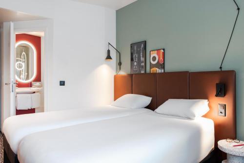 Habitación Doble - 2 camas del hotel Ibis Lausanne Centre. Foto 6