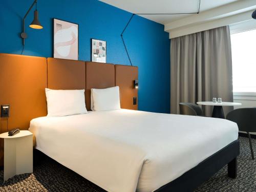 Habitación Doble Confort del hotel Ibis Lausanne Centre. Foto 1