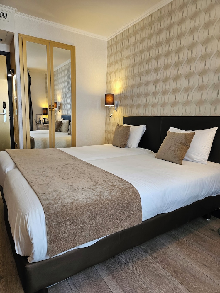 Habitación con 2 camas individuales del hotel Atn Hotel. Foto 4