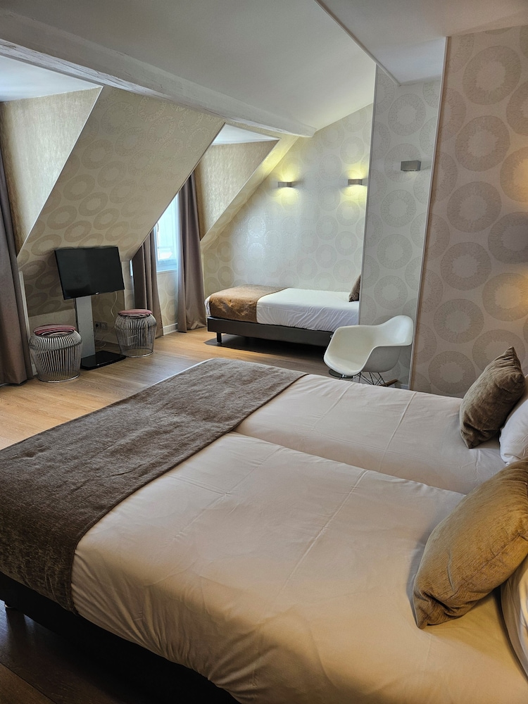 Habitación triple del hotel Atn Hotel. Foto 2