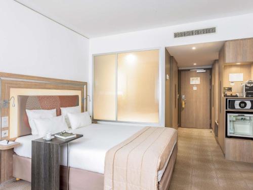 Habitación Superior: para no fumadores y con cama doble del hotel Novotel Lugano Paradiso. Foto 6
