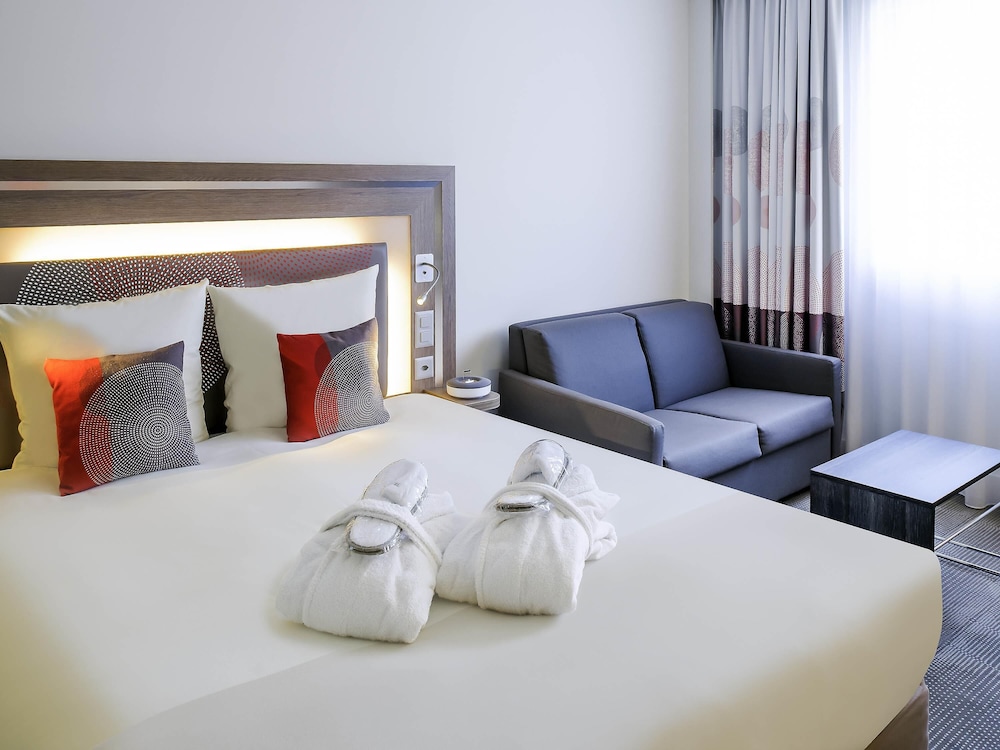 Habitación Executive Ticino: para no fumadores y con cama doble y sofá cama en estilo local del hotel Novotel Lugano Paradiso