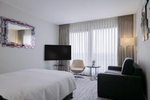 Habitación Familiar Deluxe comunicada del hotel Doubletree By Hilton London - Greenwich. Foto 18
