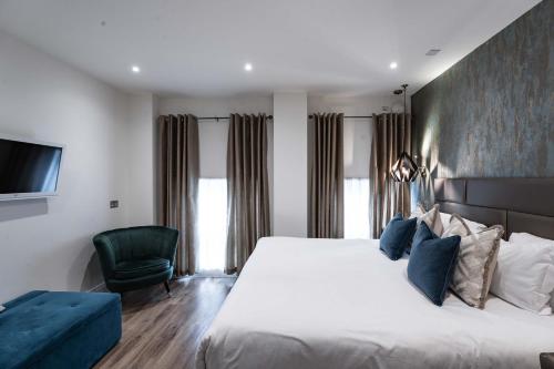 Habitación Doble Deluxe con cama supletoria del hotel The Jade. Foto 5