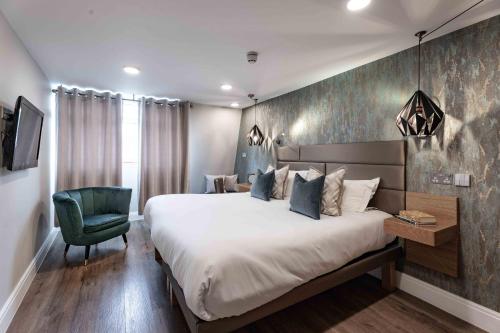 Habitación Doble Deluxe con cama supletoria del hotel The Jade. Foto 10