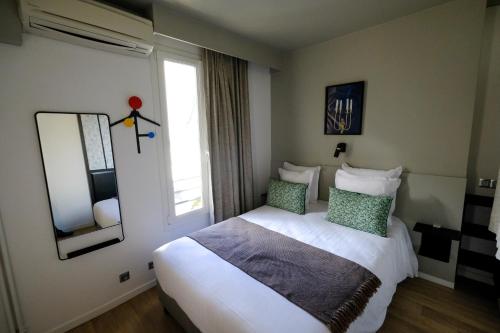 Habitación Doble Estándar del hotel Lucien. Foto 9