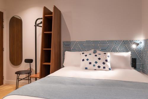 Habitación Individual Clásica Stripe del hotel Paris Art Quartier Latin By Malone. Foto 1