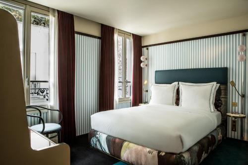 Habitación Doble Clásica del hotel Hôtel du Rond-Point des Champs-Élysées. Foto 1