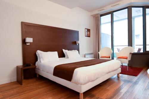 Estudio Balcón o Terraza Vista Patio Con Vistas Sofá Cama incluido 1 Cama doble del hotel Residhotel Impérial Rennequin