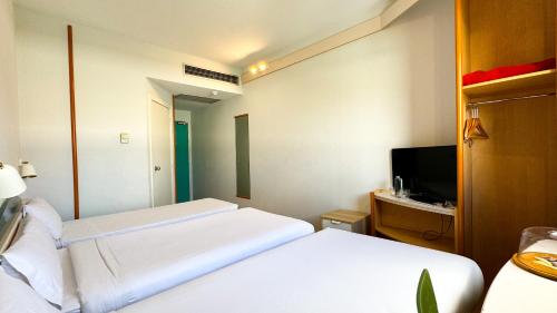 Habitación Triple del hotel Iris Guadalajara