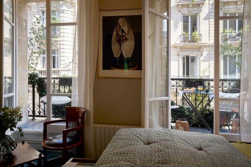 Habitación Doble Deluxe con balcón del hotel BEAUSEJOUR RANELAGH. Foto 6