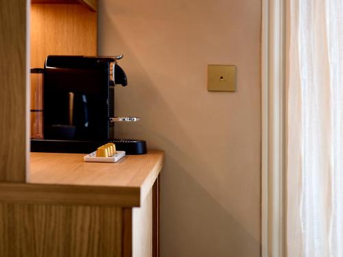 Suite con terraza del hotel BEAUSEJOUR RANELAGH. Foto 21