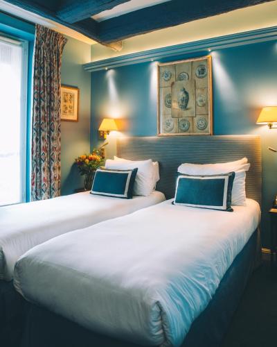 Habitación Doble Clásica del hotel Le Relais Montmartre. Foto 1