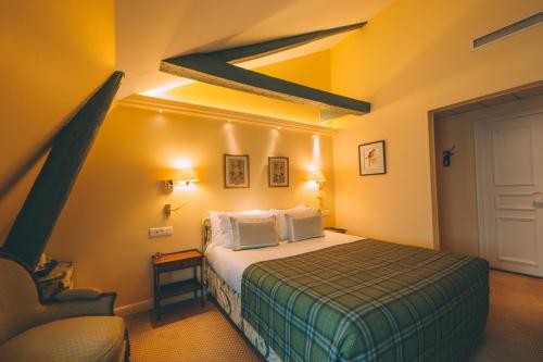 Habitación Triple del hotel Le Relais Montmartre. Foto 2