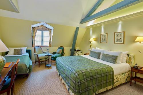 Habitación Triple del hotel Le Relais Montmartre. Foto 4