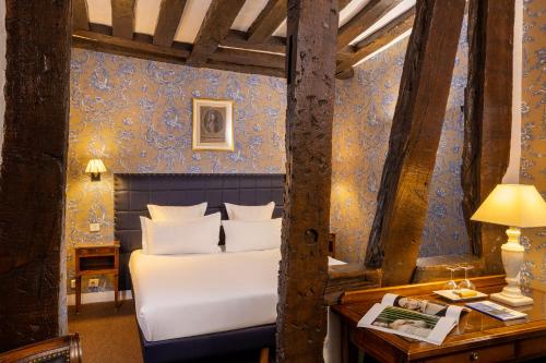 Habitación Doble Deluxe - 1 o 2 camas del hotel RELAIS HOTEL DU VIEUX. Foto 1