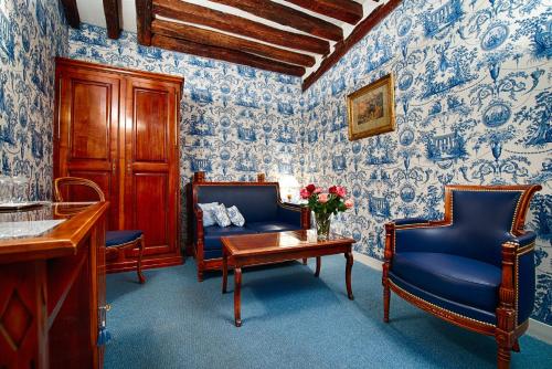 Suite del hotel RELAIS HOTEL DU VIEUX. Foto 3