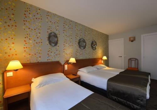 Habitación Triple del hotel Relais Du Pré. Foto 1