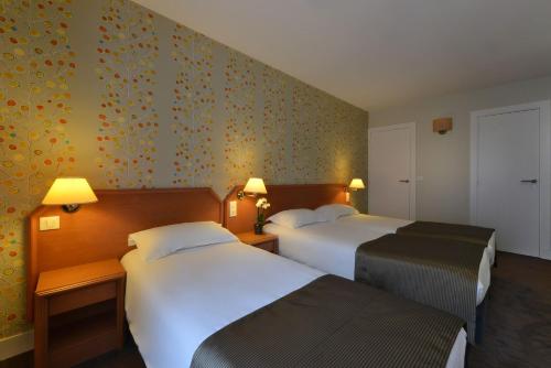 Habitación Triple del hotel Relais Du Pré. Foto 2