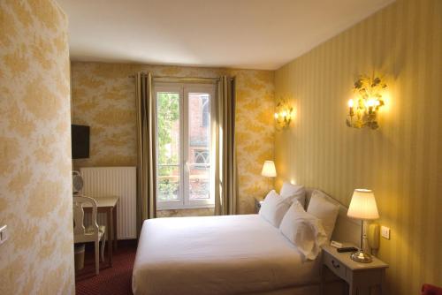 Habitación Confort del hotel Regyn's Montmartre. Foto 1