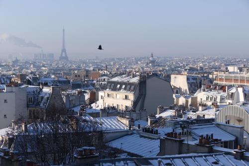 Deluxe Double or Twin Room with Partial Eiffel Tower or Sacré Coeur View del hotel Regyn's Montmartre