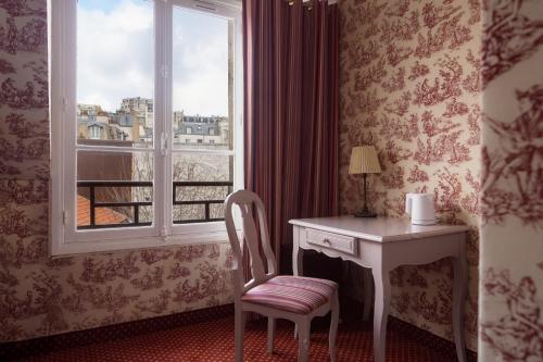 Deluxe Double or Twin Room with Partial Eiffel Tower or Sacré Coeur View del hotel Regyn's Montmartre. Foto 9