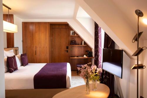 Suite con terraza del hotel Maison FL. Foto 3